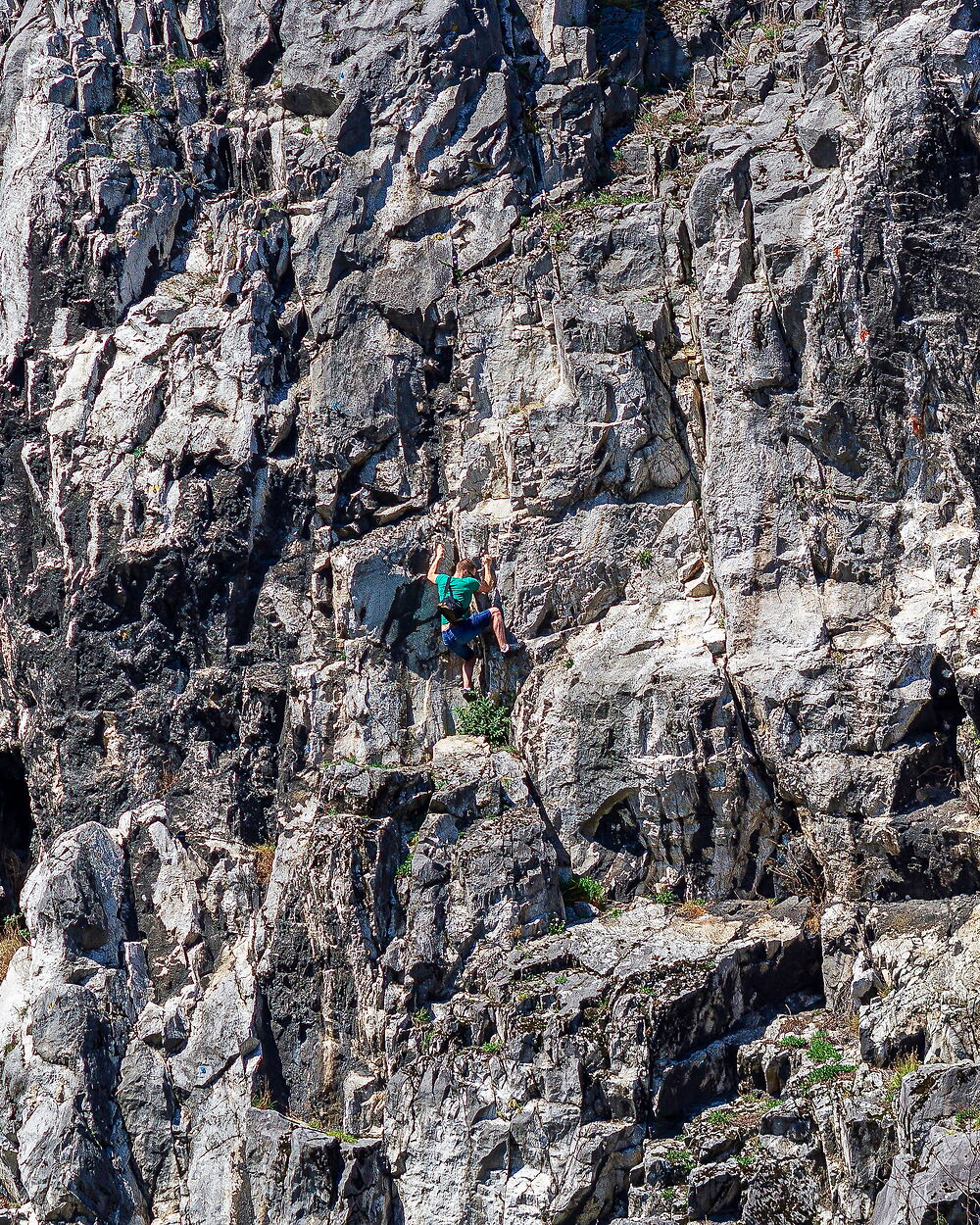 Lenny Obez free-soloing a steep rock face, no rope